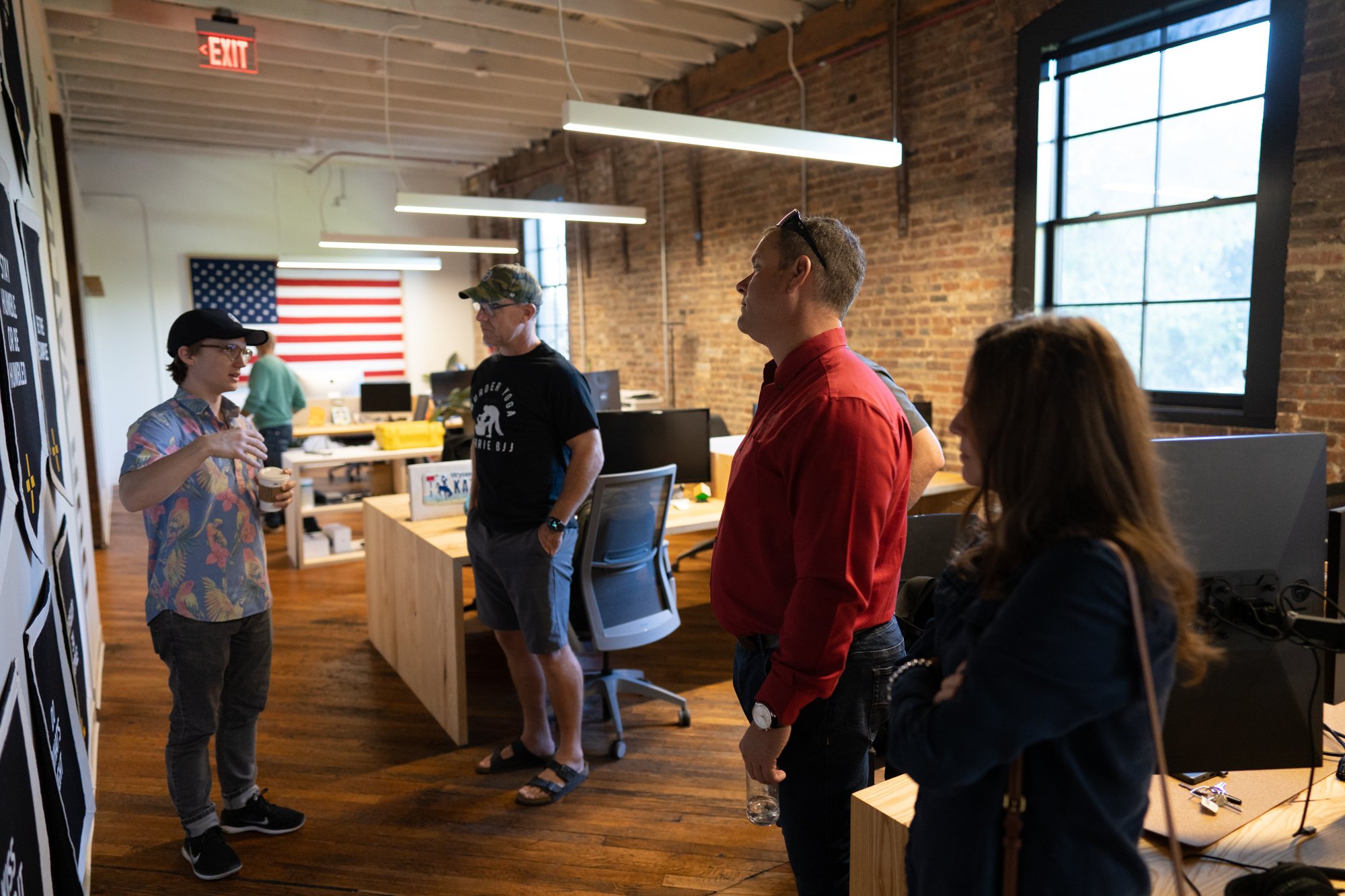 Aaron takes Ryan and Bryan around the office