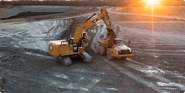 Excavator and Articulated Haul Truck