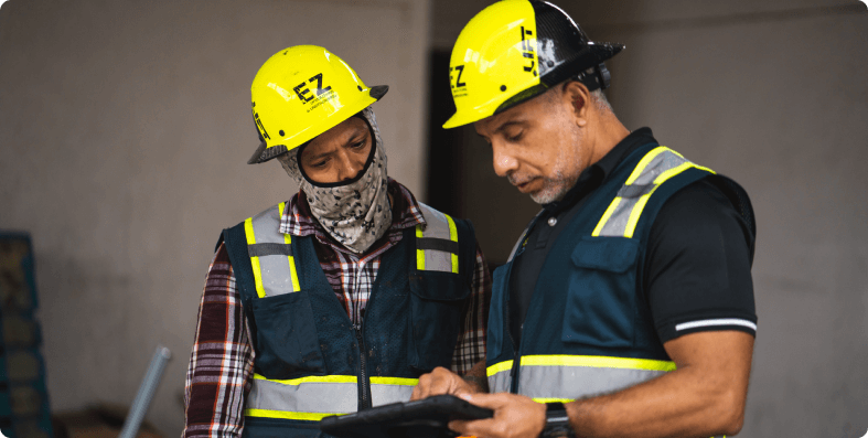 Foreman helping crew member